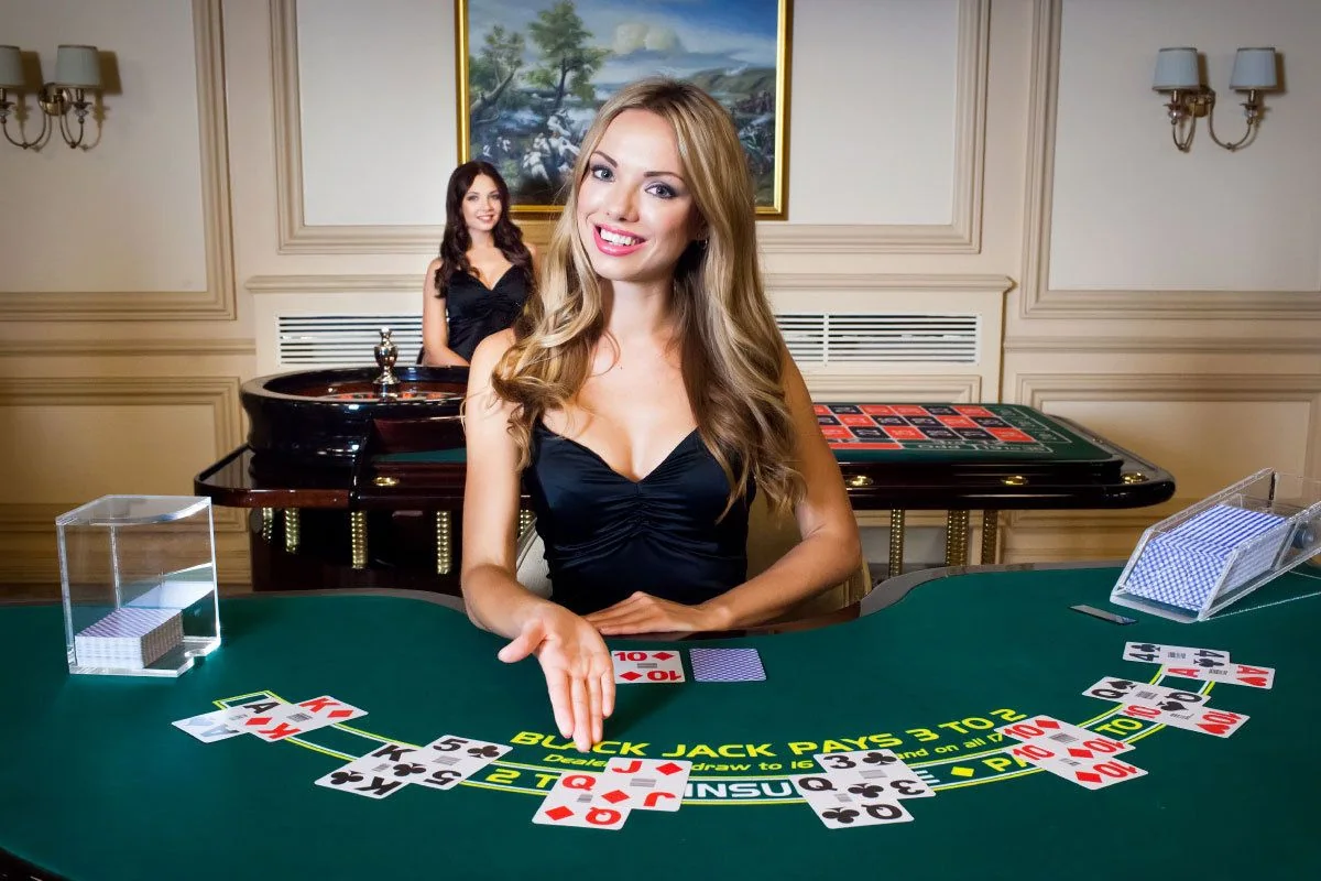 Suasana meja kasino live dengan dealer di PARISBOLA